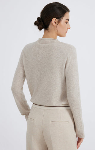 Light gray cashmere knit top, back view, crew neck and stitched pocket detail
