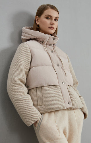 Camel hooded puffer jacket with quilted body, ribbed sleeves, and snap placket