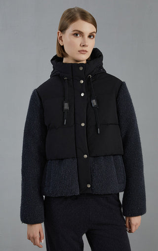 Dark gray hooded down jacket with wool-knit sleeves and snap front, drawstring cords