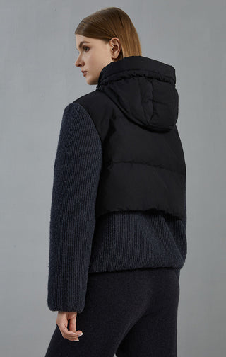 Dark gray hooded down jacket back view with knit hem and quilted puffer shoulders