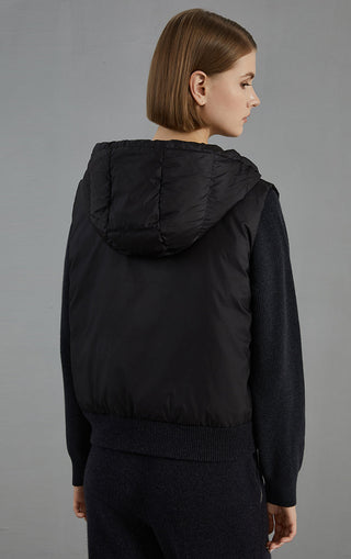 Black down vest back view with quilted hood and knit hem band; full-zip styling
