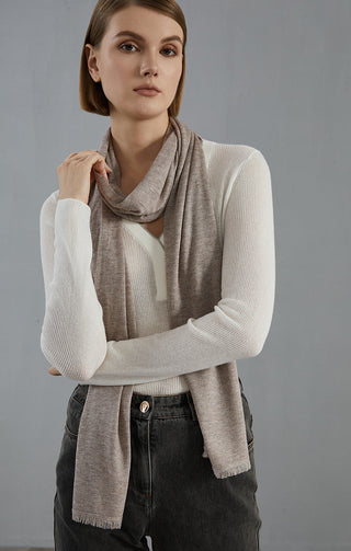 Taupe-brown lightweight wool-blend scarf with fringes, wrapped and hanging down the front