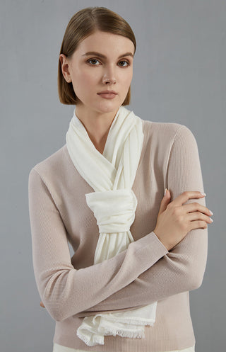 Off-white wool-blend scarf, tied at neck and loosely wrapped with fringed detail