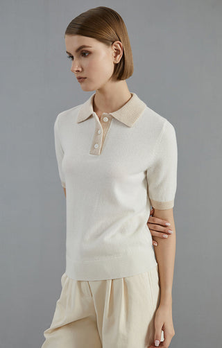 White cashmere polo sweater, short sleeves, ribbed knit hem and buttoned polo placket