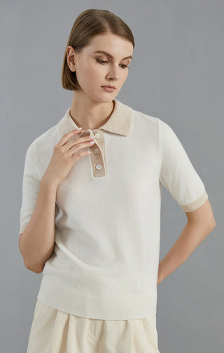 White cashmere short-sleeve polo sweater detail: button placket and ribbed collar
