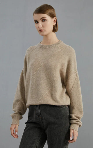 Camel cashmere diamond-pattern knit sweater, side view with ribbed cuffs