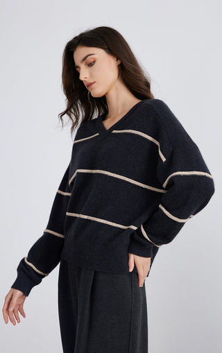 Graphite gray cashmere V-neck sweater with cream stripe bands in a relaxed fit