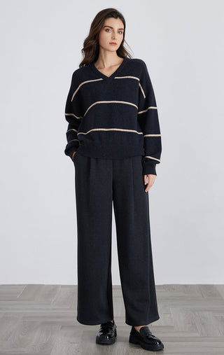 Graphite gray V-neck striped cashmere sweater with cream stripe bands and ribbed hem