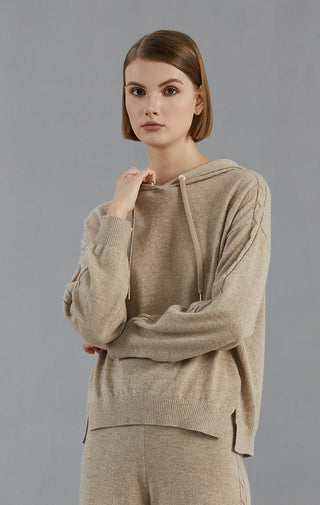 Camel cashmere hooded sweater in front view; drawstring hood and textured knit sleeves