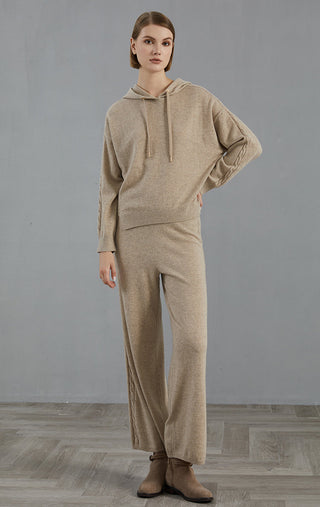 Camel cashmere hooded sweater with drawstring hood and ribbed cuffs; laid-back fit