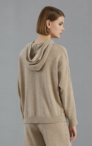 Camel hooded cashmere sweater, back view; hood drape with textured sleeve knit