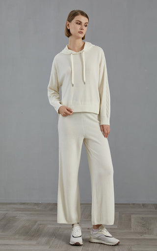 White cashmere hooded sweater with drawstring hood; ribbed cuffs and relaxed fit