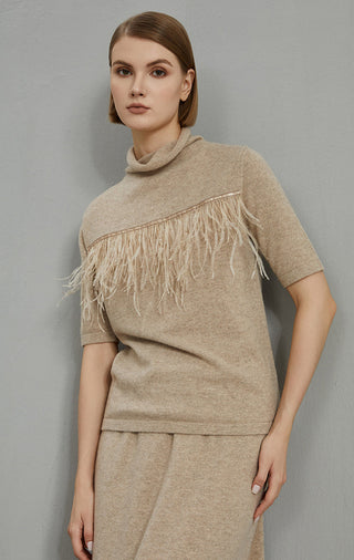 Camel high-neck short-sleeve sweater with wide fringe band across chest