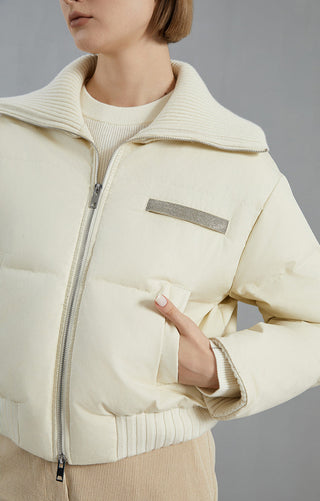 White cashmere down jacket close-up of chest patch pocket and stand collar detail