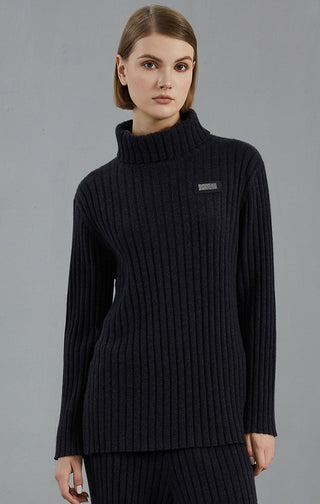 Dark charcoal ribbed cashmere turtleneck sweater with beaded logo patch on chest