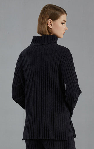 Dark charcoal ribbed turtleneck sweater, back view with vertical knit texture