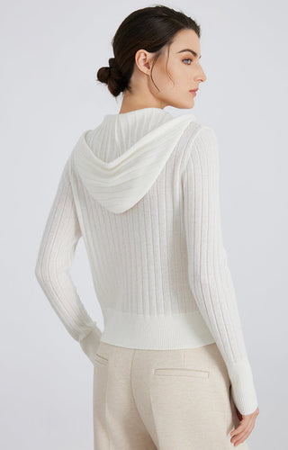 White ribbed hooded zip knit cardigan, back view with draped cowl hood detail.
