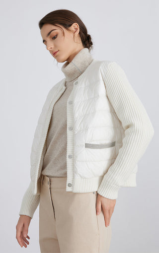 White down puffer jacket with ribbed-knit sleeves, snap placket, side flap pockets