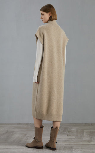 Camel cashmere knit coat back view, sleeveless shoulders and ribbed hem