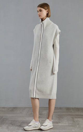 Light gray cashmere knit coat with front zip, stand collar, and side seam pockets