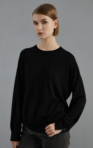 Black fine-knit wool round-neck sweater with relaxed fit and long sleeves