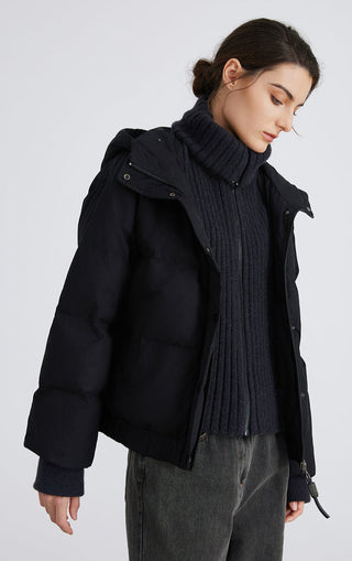 Graphite gray hooded puffer jacket with ribbed mock neck, zipper front and snap placket