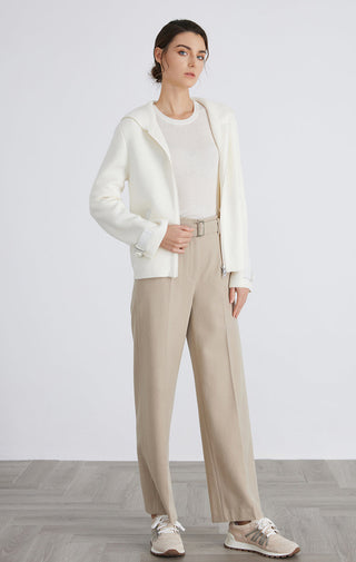 White wool knit hooded jacket, front zip; relaxed fit with ribbed cuffs.