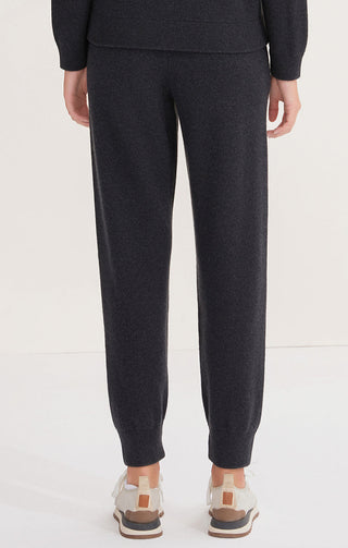 Black wool knit trousers, back view with straight center seam and ankle cuff
