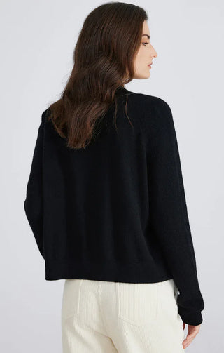 Black cardigan sweater back view with curved knit hemline