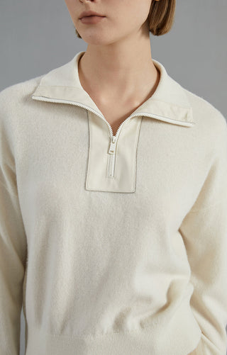 White cashmere half-zip neckline with half-button placket and zipper pull detail