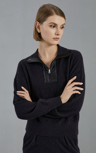 Graphite gray half-zip cashmere sweater with stand collar zipper and relaxed silhouette