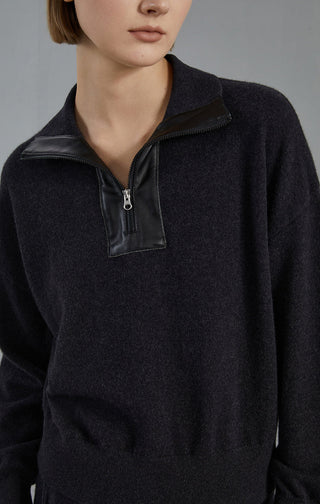 Graphite gray cashmere half-zip collar with zipper pull and stitched placket detail