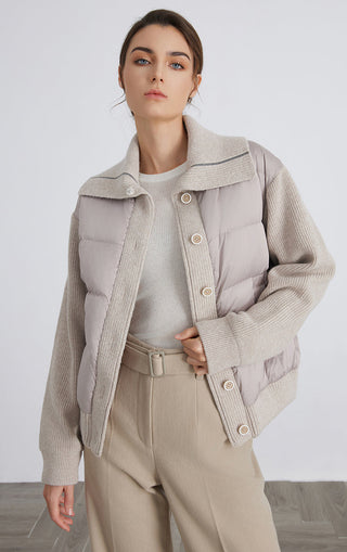 Camel hybrid down knit jacket with high collar, snap buttons, and ribbed cuffs