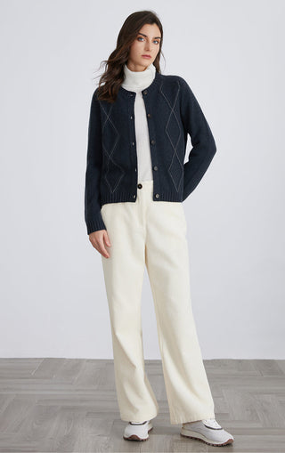 Dark navy wool knit cardigan with diamond-line paneling and button front.