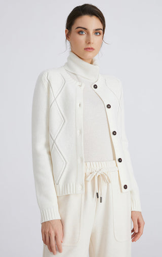 White knit cardigan with turtleneck collar, diamond line detailing, dark buttons