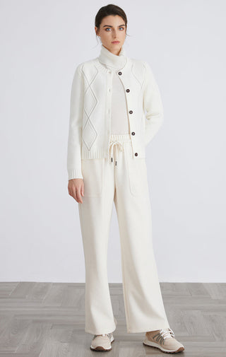 White knit cardigan with diamond line pattern, button front, ribbed cuffs