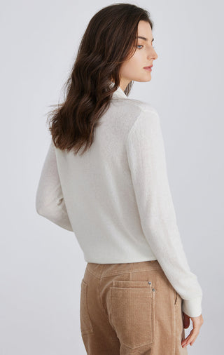 White cashmere V-neck pullover from back view, long sleeves and soft knit texture