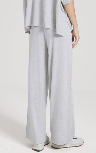 Light gray straight-leg pants showing full leg and back view with wide hem opening