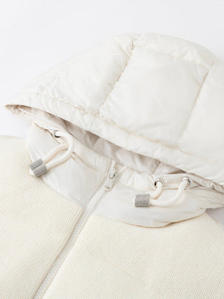 Ivory hooded vest with drawcord toggles at the collar and zip front