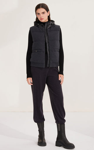 Black hooded down vest, two flap pockets, full zipper, ribbed knit hem