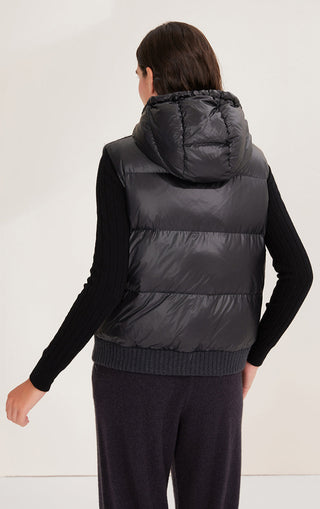 Black quilted hooded down vest back, drawstring hood, ribbed hem