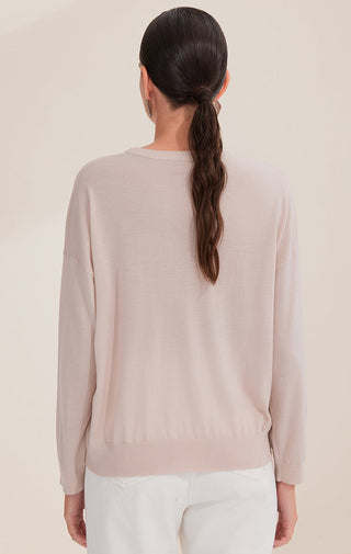 Light apricot wool crewneck knit sweater, back view with silver bead line detail