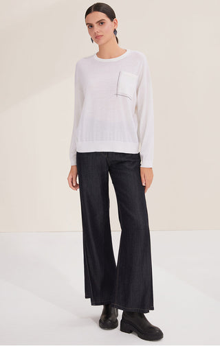 White wool crewneck knit, long sleeves, silver bead line motif on front pocket panel