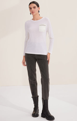 White wool knit top with beaded chest pocket detail, long sleeves, straight hem