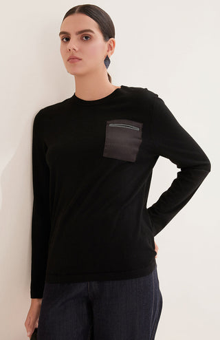 Black wool knit top with beaded chest pocket detail, long sleeves, relaxed fit