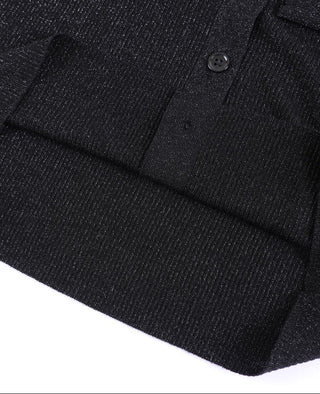 Black ribbed polo sweater cuff and hem detail with buttons