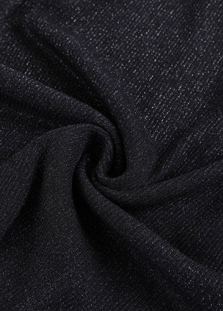 Black wool-blend fabric texture swatch from ribbed polo sweater