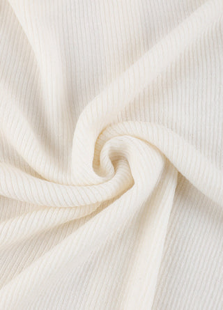 White fine ribbed knit fabric texture on polo sweater
