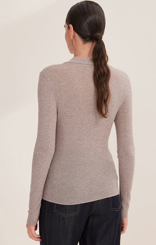 Light apricot wool blend ribbed crewneck pullover from back view with long sleeves