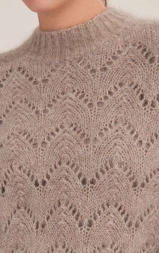 Camel openwork knit texture with small sequins across the sweater front